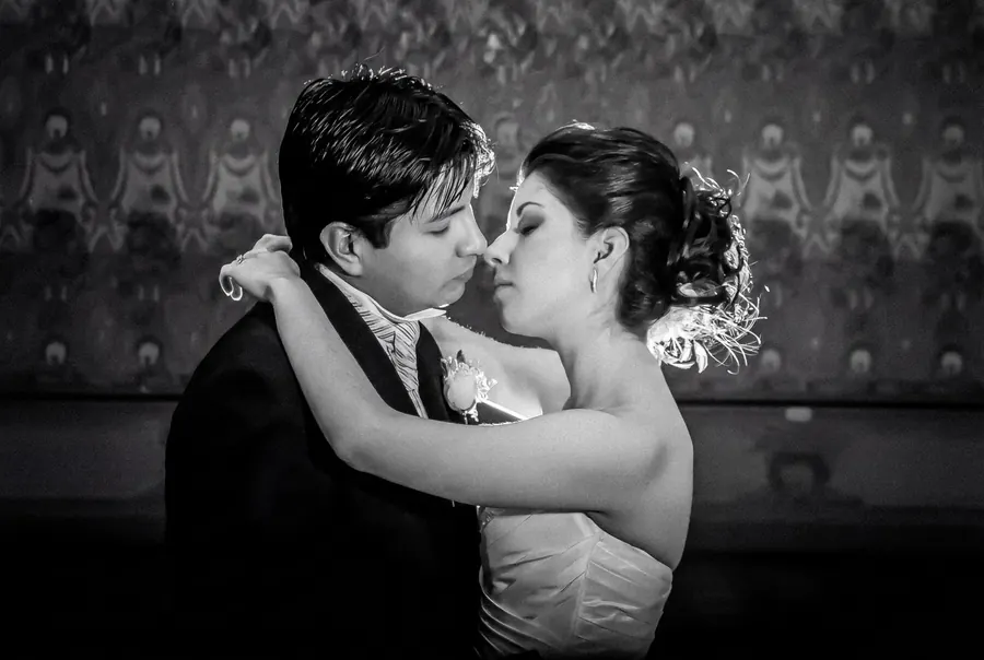 The couple’s first dance in black and white, an intimate moment of the celebration